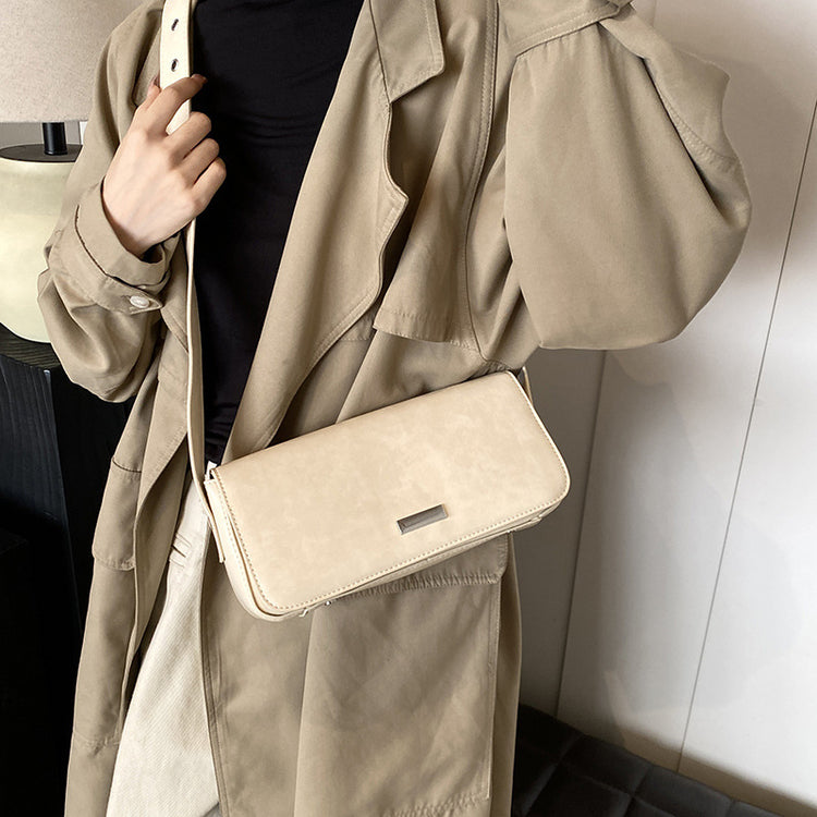 AngShop functional elegant purse women in beige worn with a tan trench coat and black top