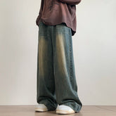 AngShop distressed wide leg jeans in faded blue denim worn with casual sneakers