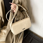 Beige functional elegant purse women carrying a stylish shoulder bag with adjustable strap