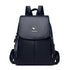 Functional leather-look backpack for daily use in navy blue with zippered pockets and adjustable straps