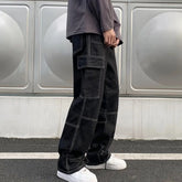 Black casual cargo trousers for men with large side pockets and contrast stitching