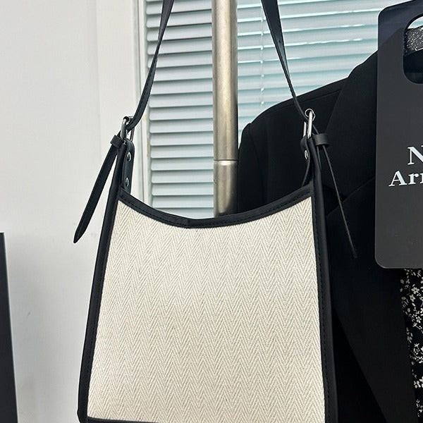 Elegant stitched handbag for women in cream and black with adjustable strap by AngShop