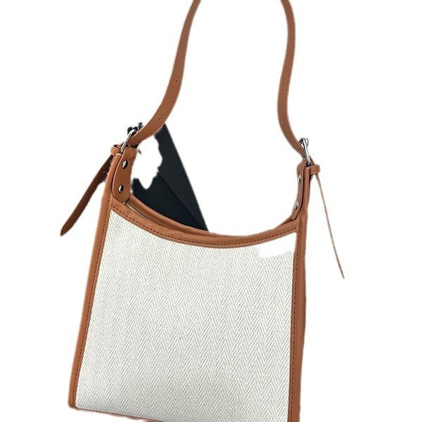Elegant stitched handbag for women with white textured fabric and brown leather straps by AngShop
