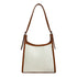Elegant stitched handbag for women in white fabric with brown leather trim and shoulder strap