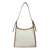 Elegant stitched handbag for women in beige and cream with a single shoulder strap