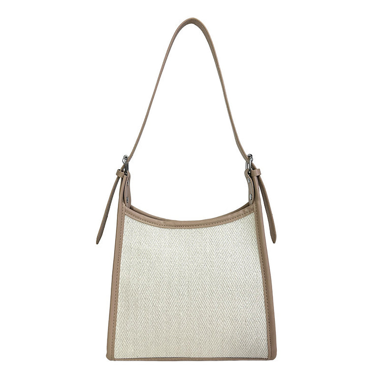 Elegant stitched handbag for women in beige and cream with a single shoulder strap