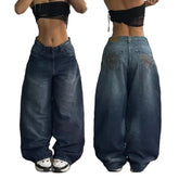 Front and back view of high waist loose fit jeans for men styled with a black crop top and sneakers