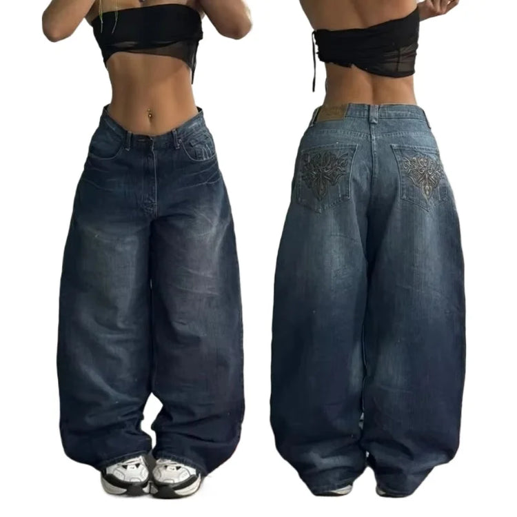 Front and back view of high waist loose fit jeans for men styled with a black crop top and sneakers