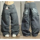 High waist loose fit jeans for men in dark gray with wide legs and graffiti back pockets