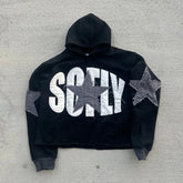 Black vintage Y2K hoodie unisex with large white letters and gray star patches on sleeves and front