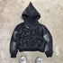 Black vintage Y2K hoodie unisex with starry dot pattern and large textured lettering on front